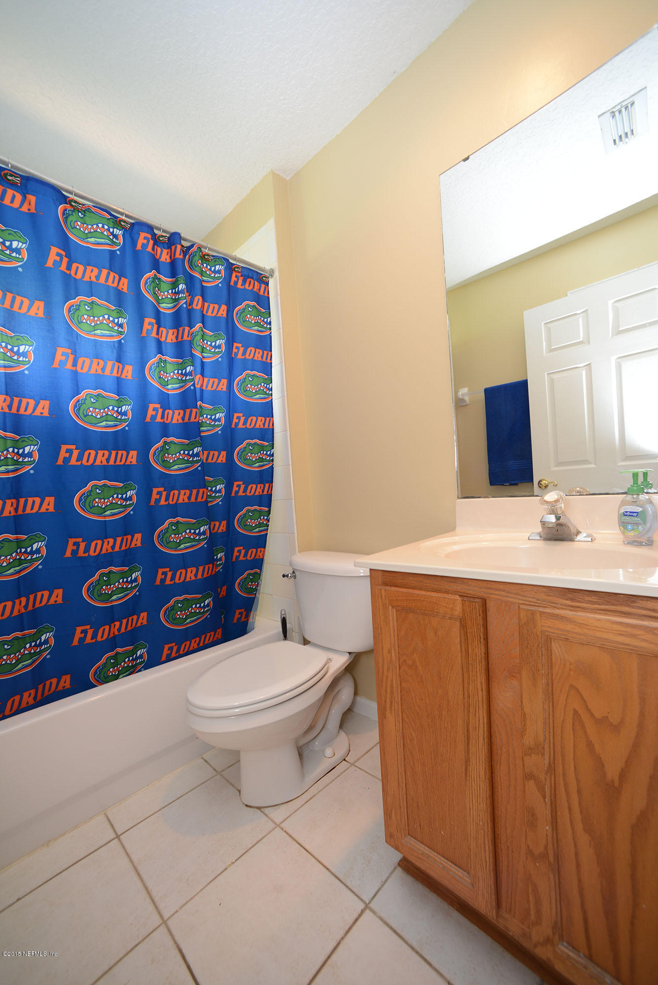 226 Riviera Boulevard St. Augustine Shores, FL 32086 - Photo 18 of 26 a bathroom with a sink toilet and shower