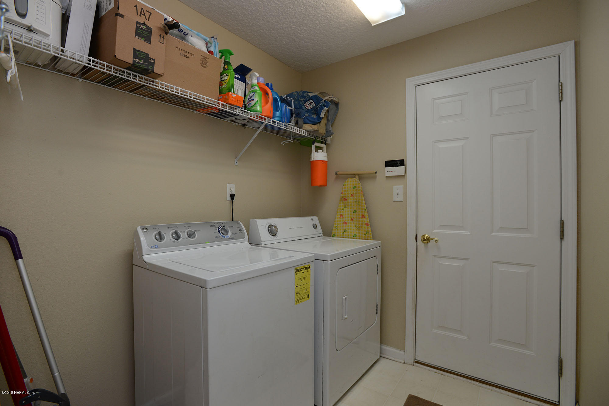 226 Riviera Boulevard St. Augustine Shores, FL 32086 - Photo 19 of 26 a utility room with dryer and washer