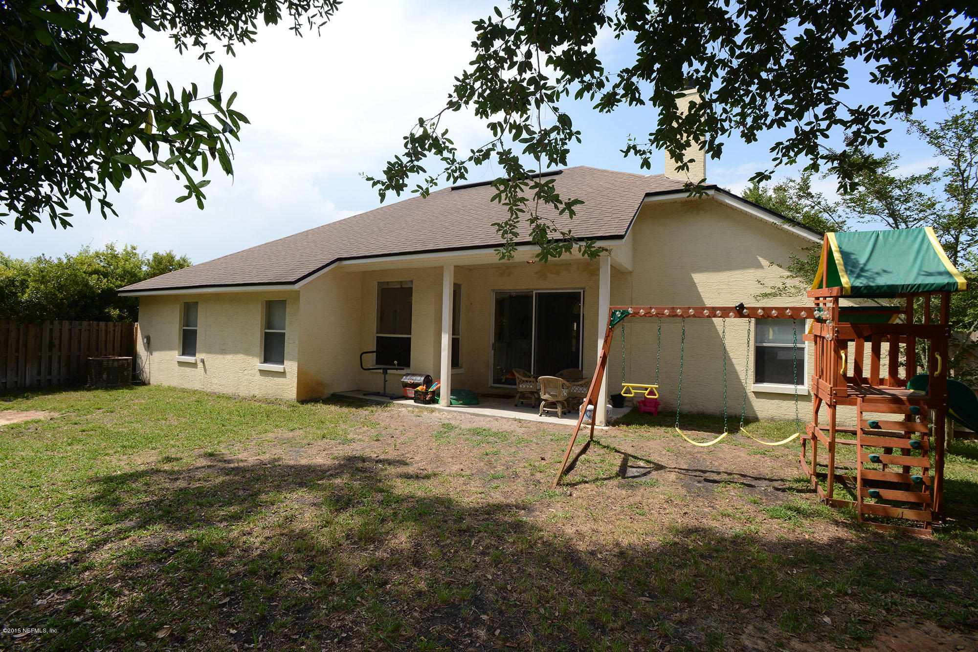 226 Riviera Boulevard St. Augustine Shores, FL 32086 - Photo 23 of 26 a view of a house with backyard