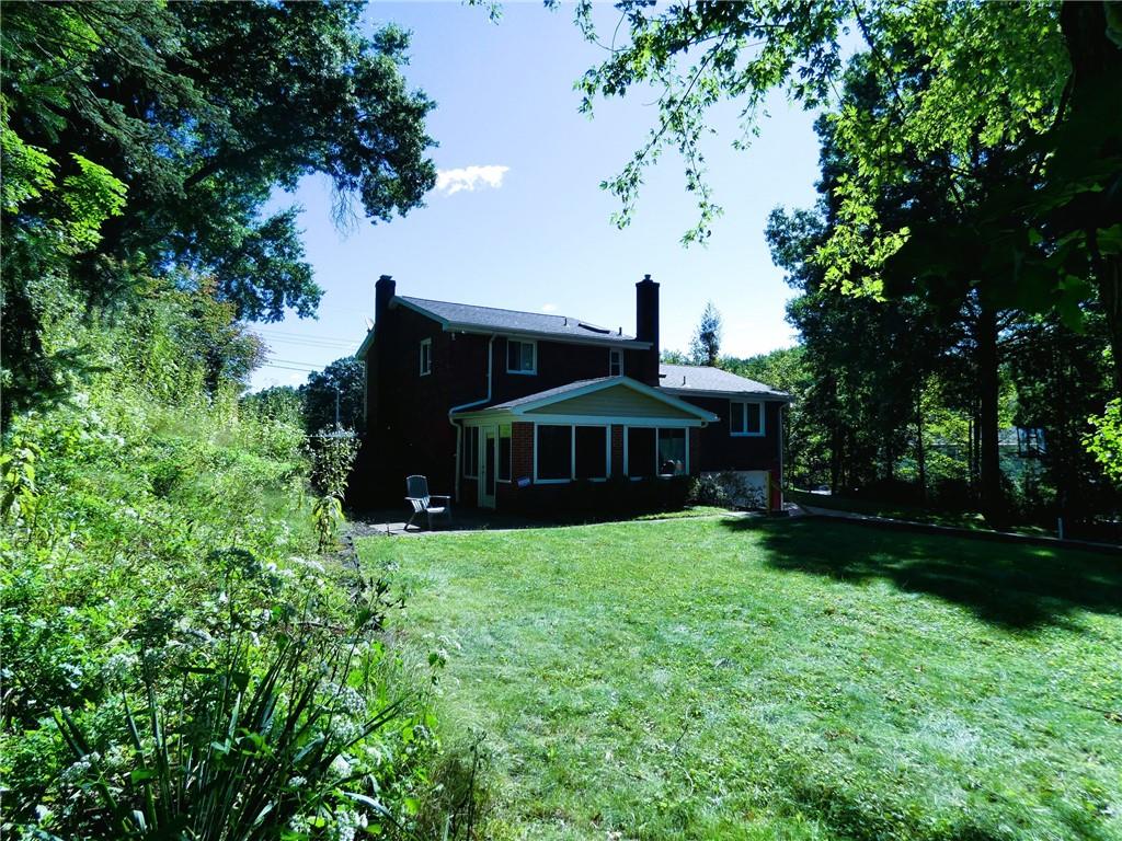 8459 Ridgemont Road Pittsburgh, PA 15237 - Photo 4 of 31 Level rear yard for quiet times or celebrations.