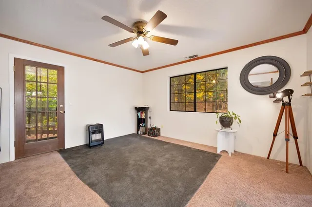 a spacious bathroom with a sink double vanity and mirror