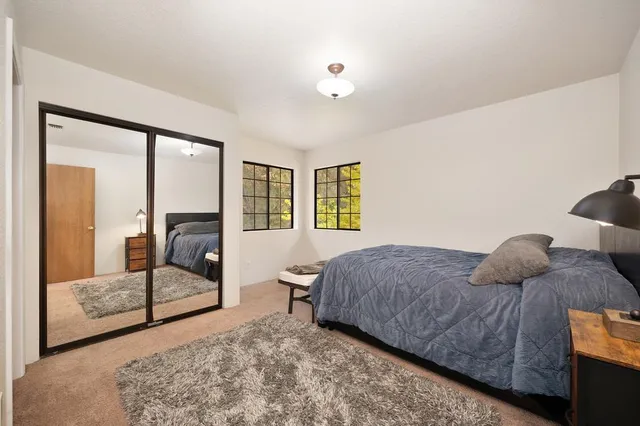 a view of balcony with furniture