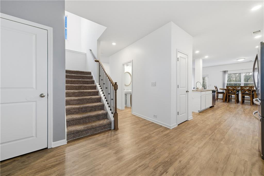 4000 Lake Manor Way Atlanta, GA 30349 - Photo 15 of 36 a view of a hallway with wooden floor and entryway