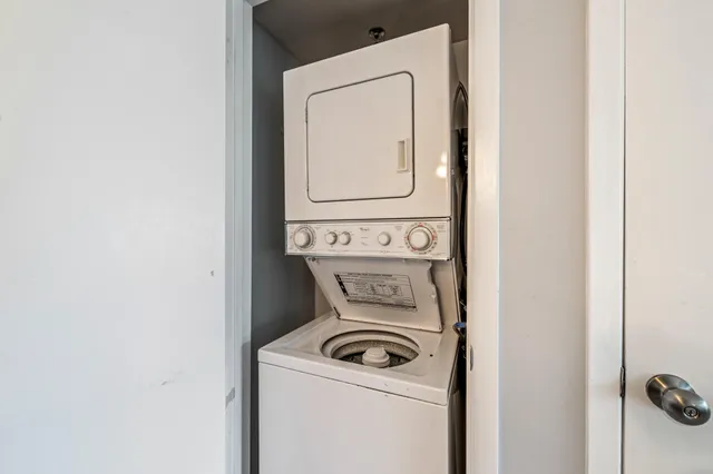 a kitchen with stainless steel appliances granite countertop a sink a stove a microwave and cabinets