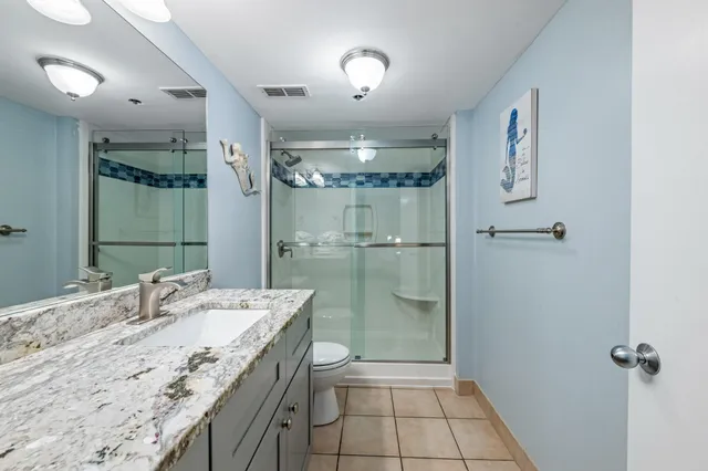 a view of ocean view and city view