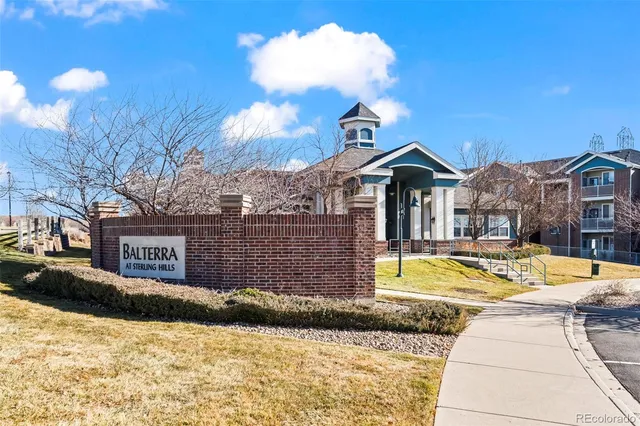 a view of a house with a snow in the yard