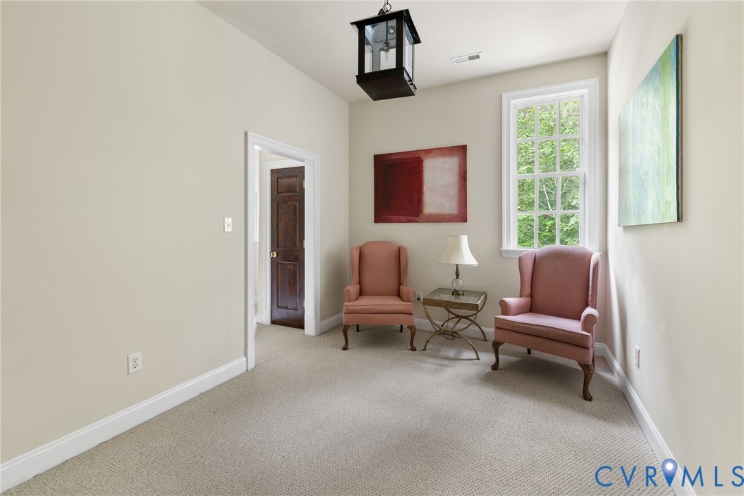 13173 Scotchtown Road Beaverdam, VA 23015 - Photo 46 of 65 a living room with furniture and a window