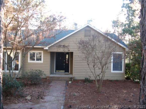 3 Pine Ridge Road Jackson Springs, NC 27281 - Photo 2 of 11 a front view of a house with plants
