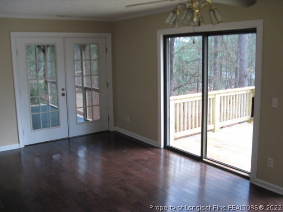 3 Pine Ridge Road Jackson Springs, NC 27281 - Photo 5 of 11 a view of an empty room with wooden floor and a window
