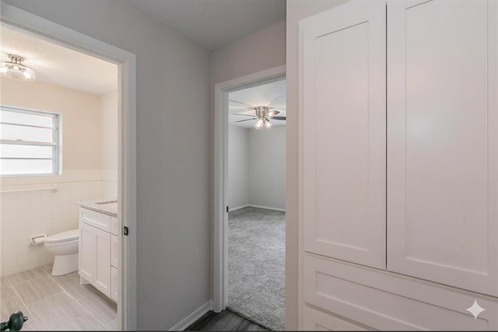 6248 Trail Lake Drive Fort Worth, TX 76133 - Photo 14 of 28 a bathroom with a granite countertop sink