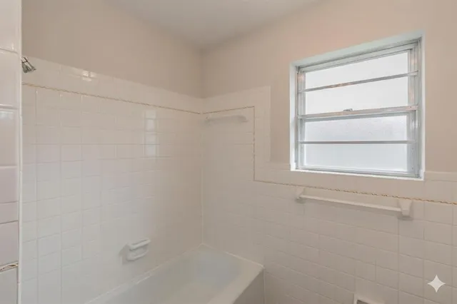 a bathroom with a bathtub