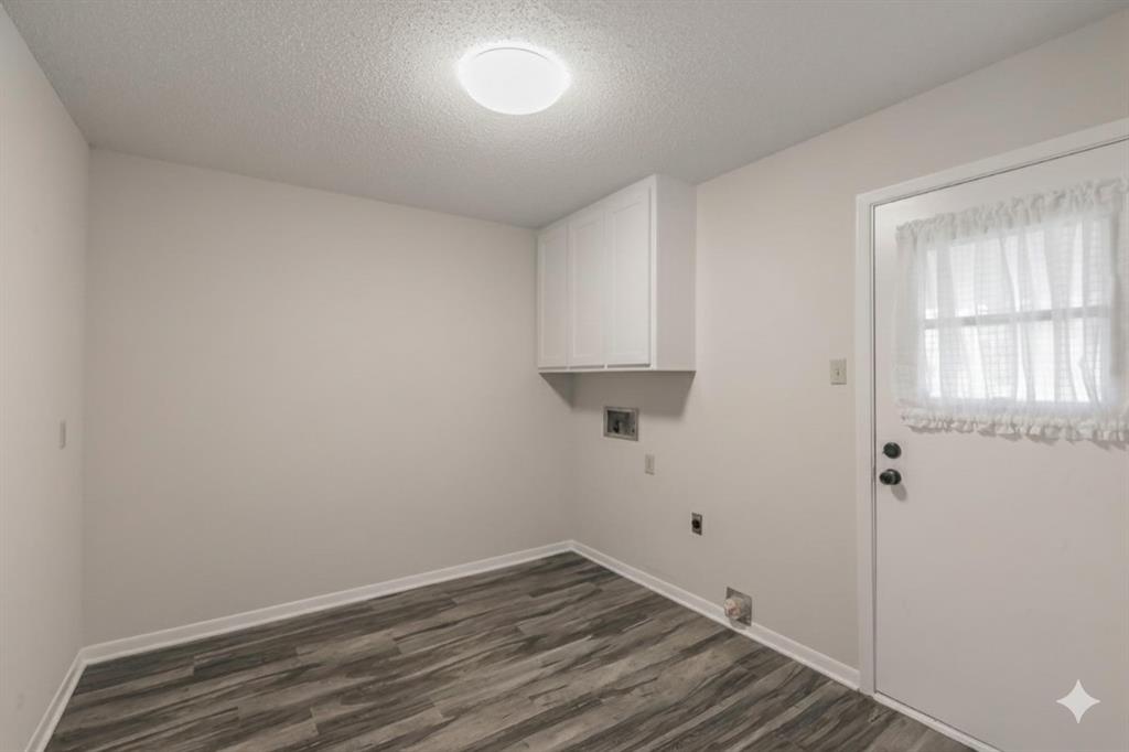 6248 Trail Lake Drive Fort Worth, TX 76133 - Photo 22 of 28 a view of room with hardwood floor and window