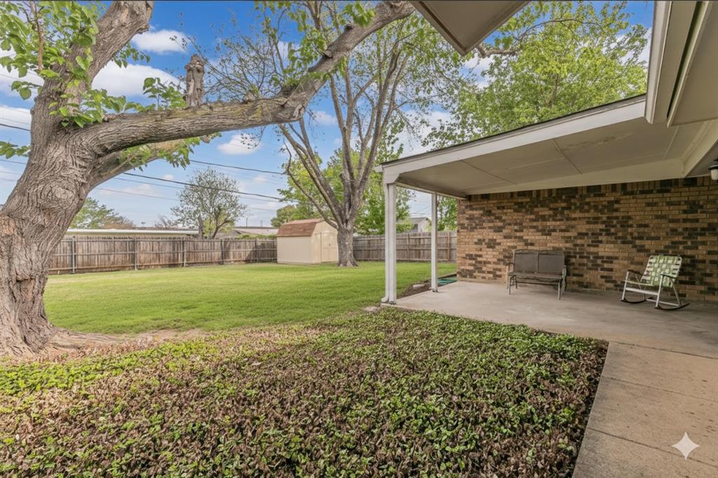 6248 Trail Lake Drive Fort Worth, TX 76133 - Photo 24 of 28 a view of a yard and front view of a house