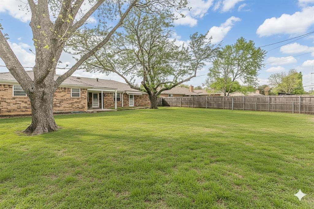 6248 Trail Lake Drive Fort Worth, TX 76133 - Photo 28 of 28 a view of a house with a big yard