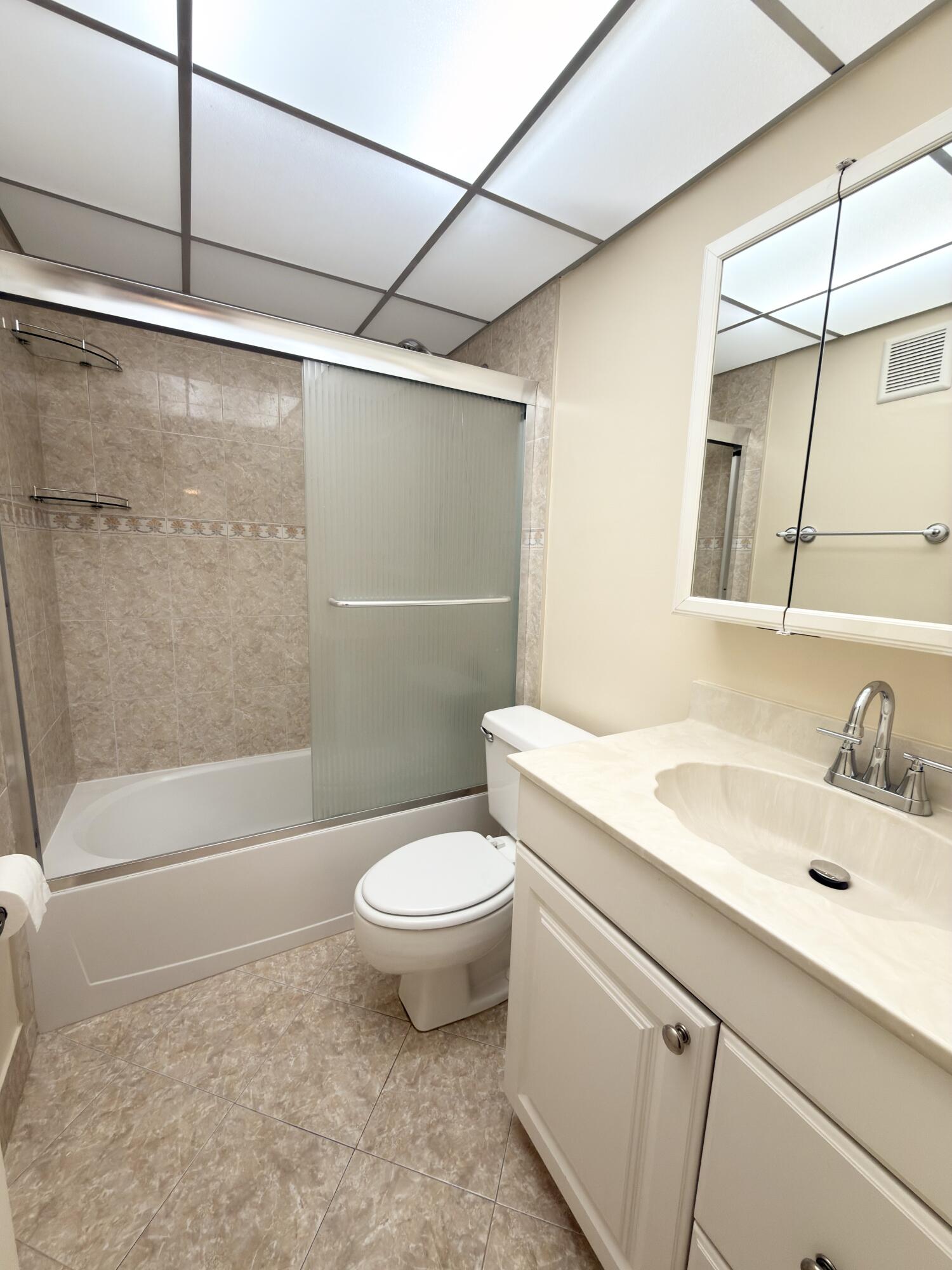 7650 West McNab Road, Unit 210 Tamarac, FL 33321 - Photo 5 of 13 Guest Bathroom