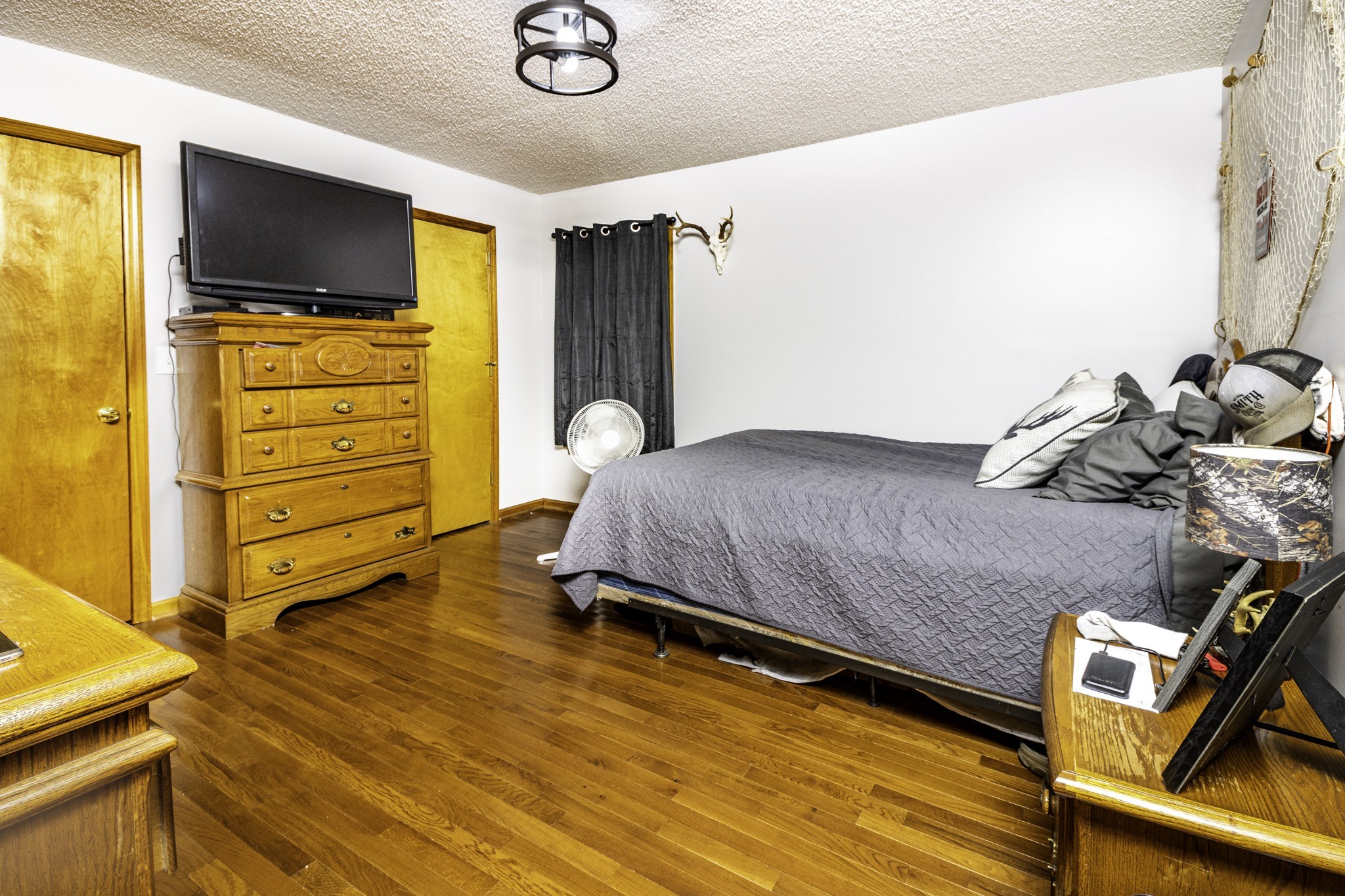 2285 Crescentview Road Pulaski, TN 38478 - Photo 11 of 31 a bedroom with a bed and wooden floor