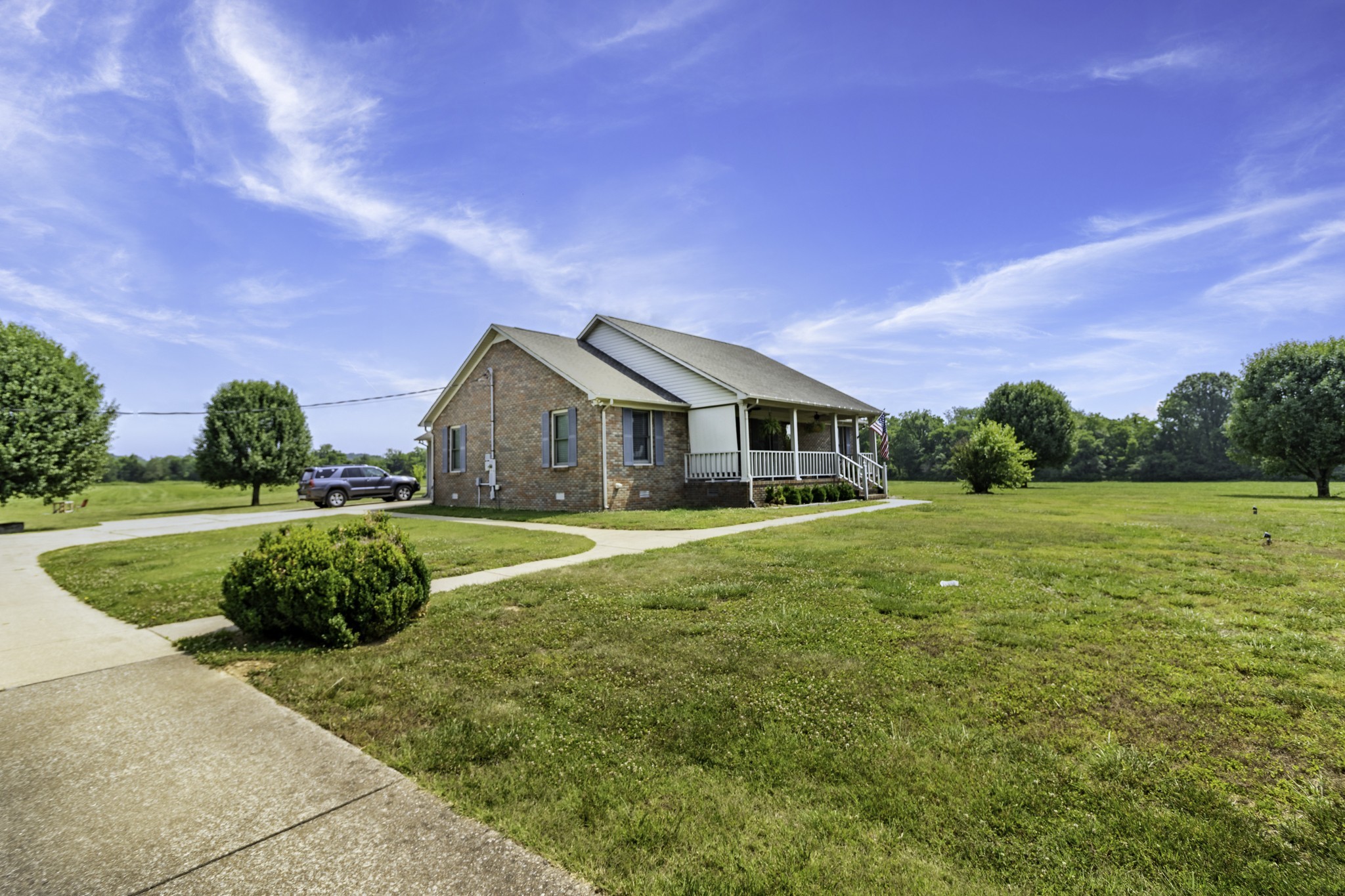 2285 Crescentview Road Pulaski, TN 38478 - Photo 13 of 31 a front view of a house with a yard