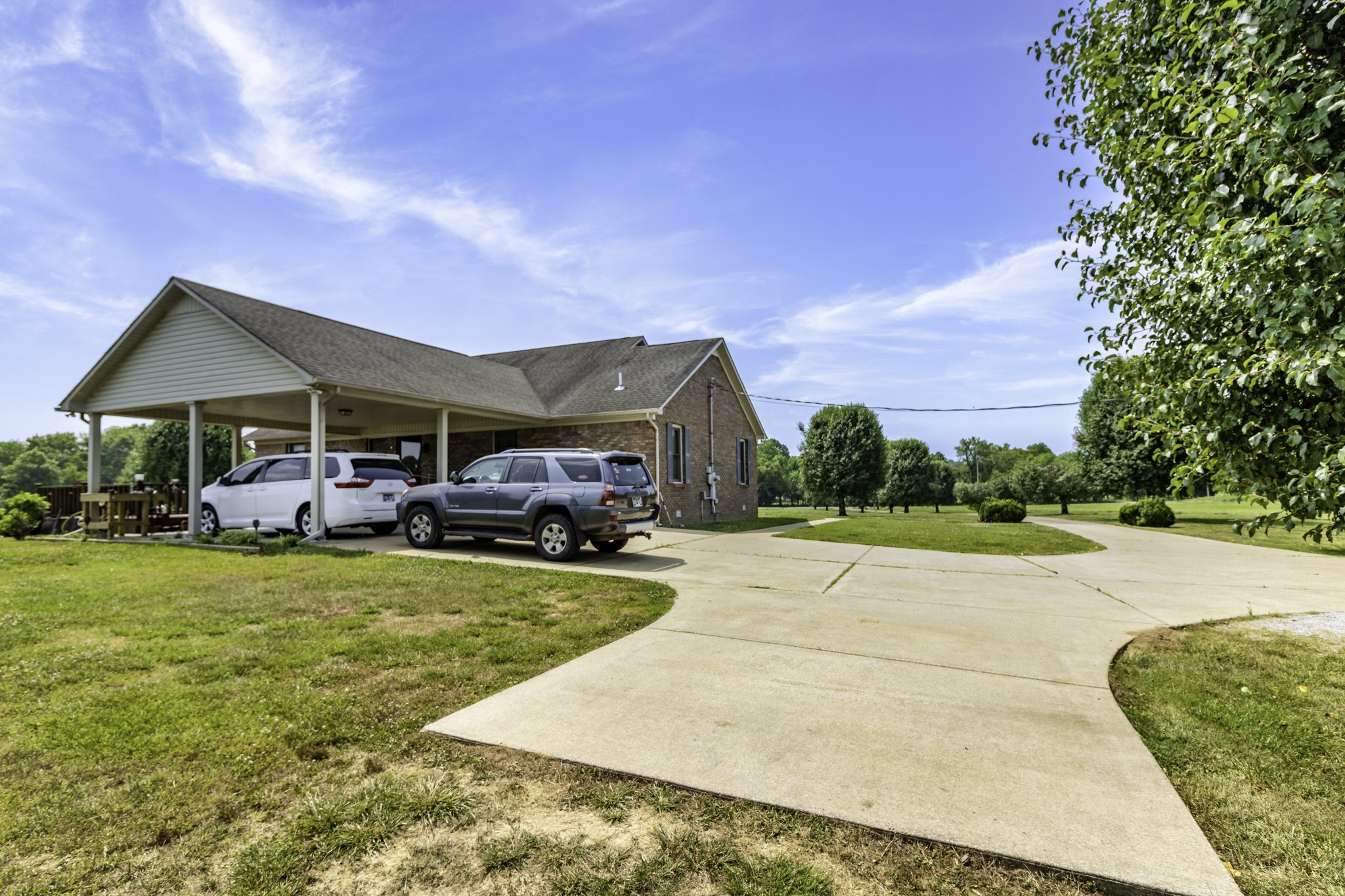 2285 Crescentview Road Pulaski, TN 38478 - Photo 19 of 31 a front view of a house with garden