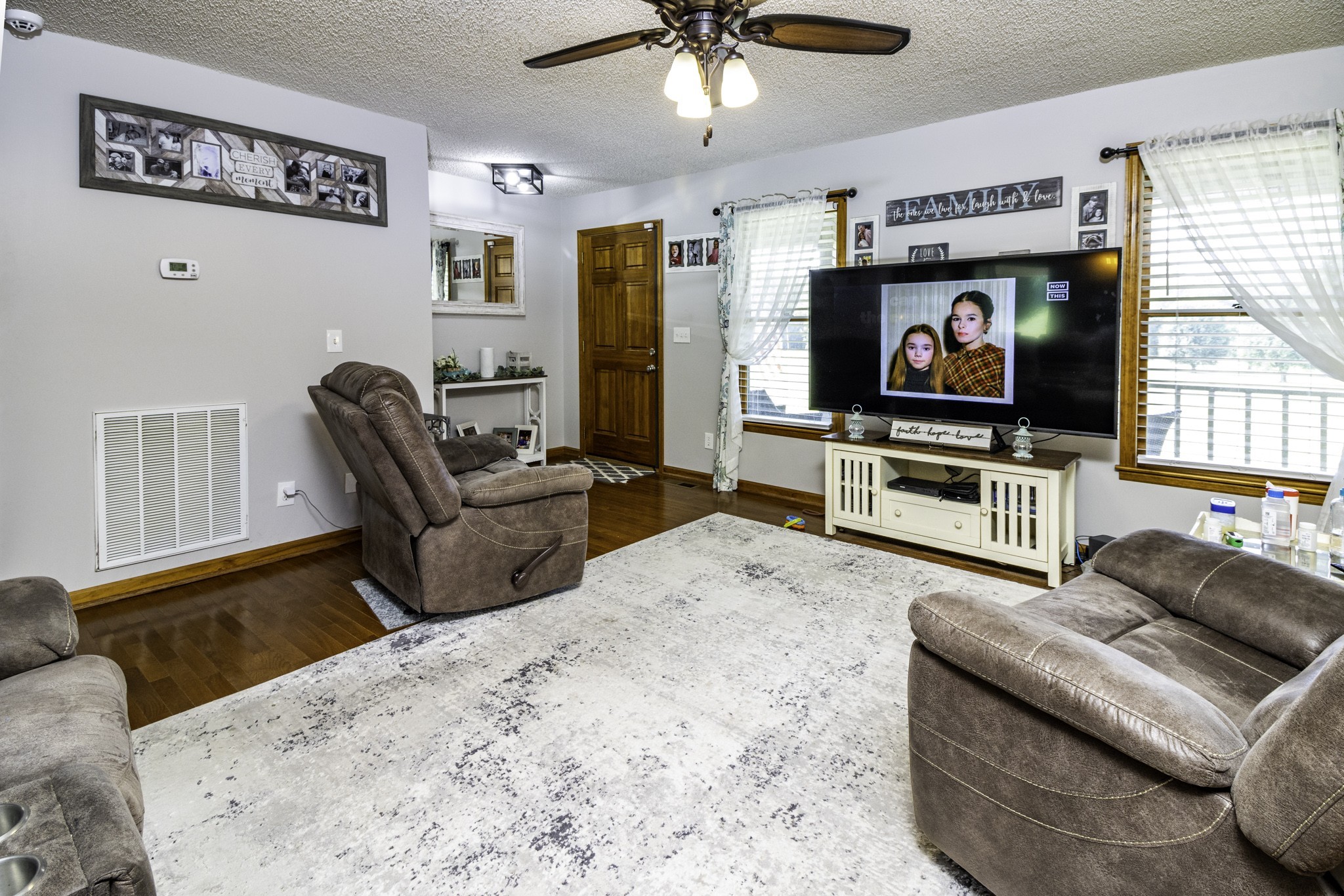 2285 Crescentview Road Pulaski, TN 38478 - Photo 2 of 31 a living room with furniture and a flat screen tv