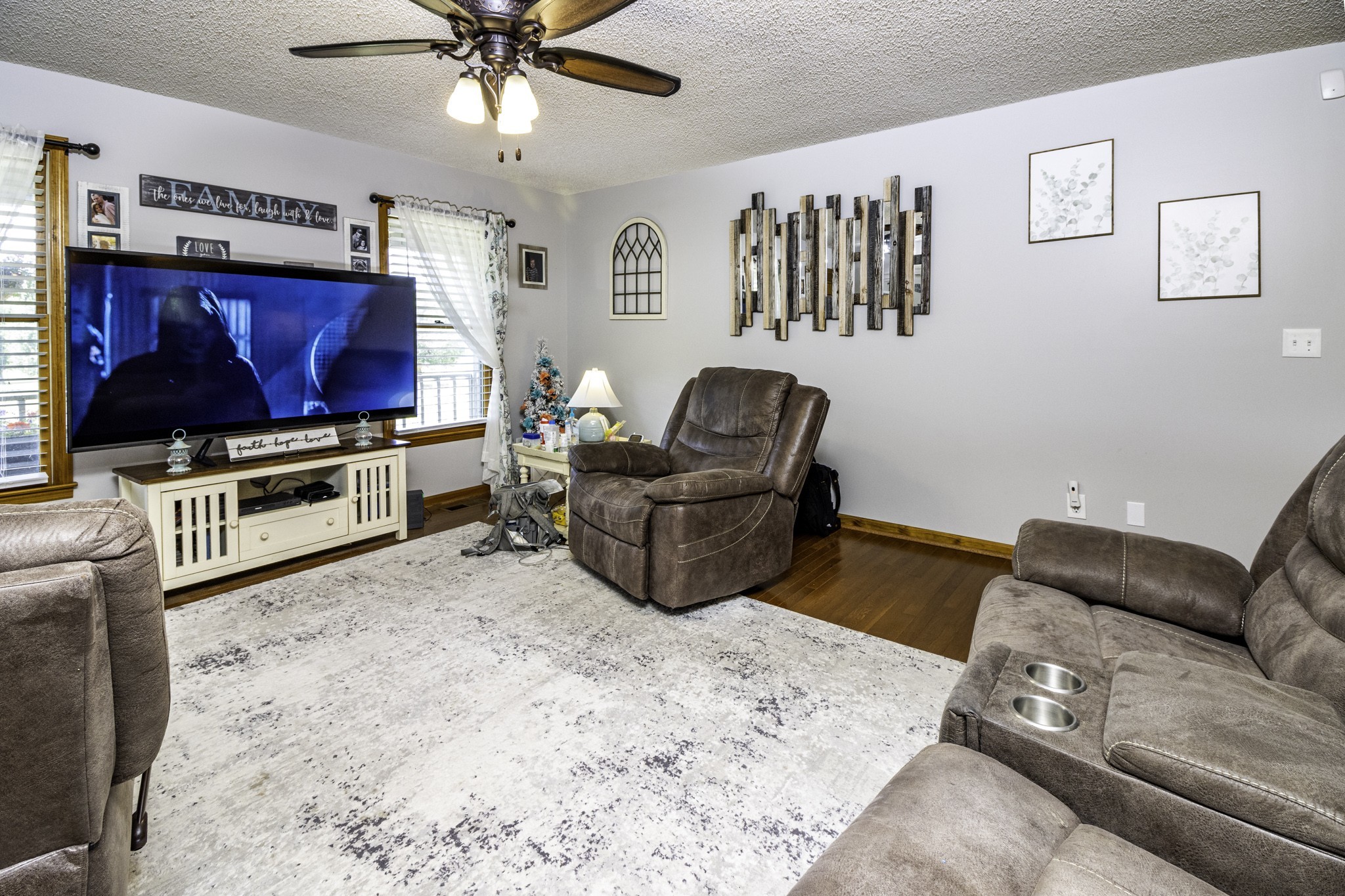 2285 Crescentview Road Pulaski, TN 38478 - Photo 3 of 31 a living room with furniture and a flat screen tv