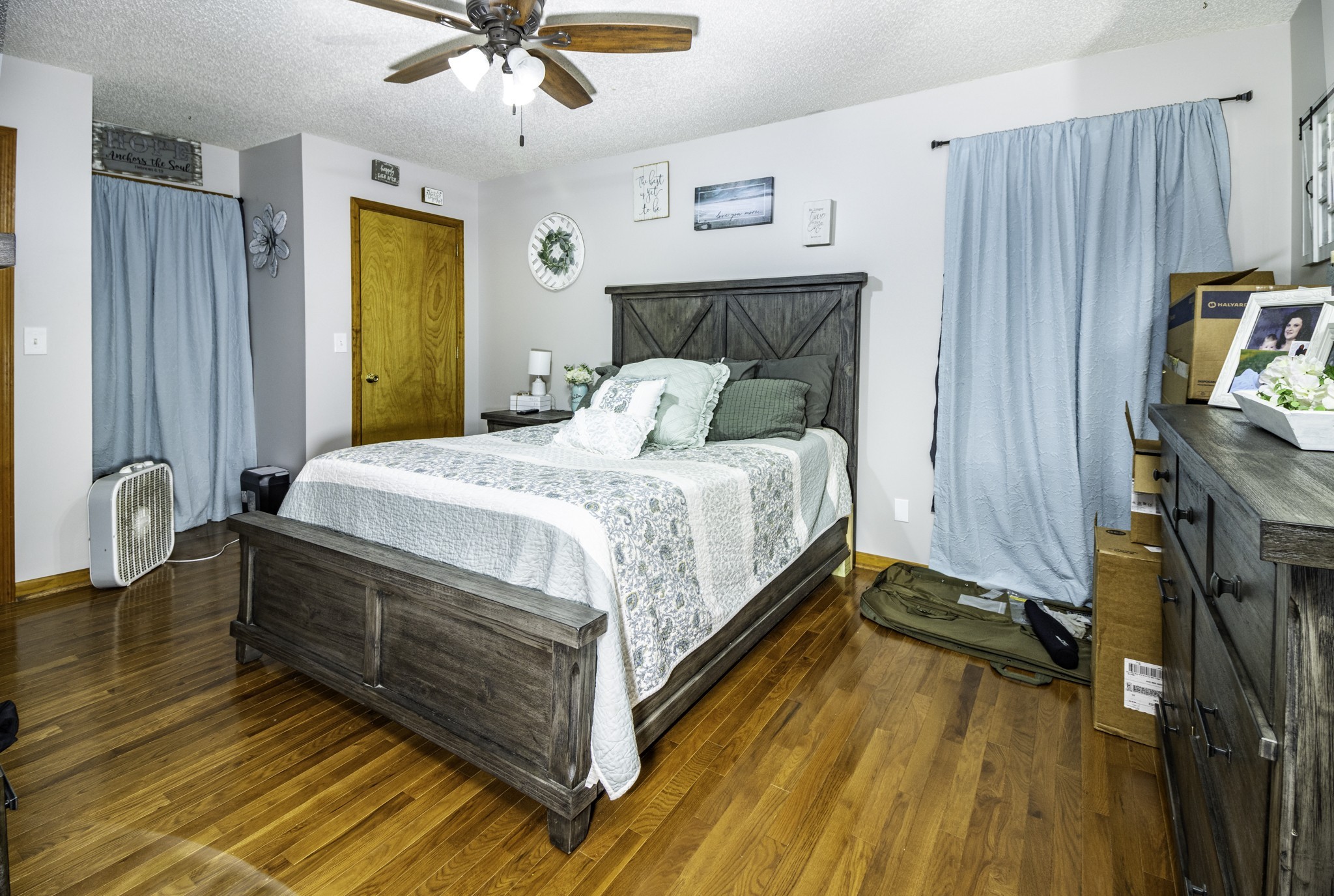 2285 Crescentview Road Pulaski, TN 38478 - Photo 8 of 31 a bedroom with a bed and a flat tv screen
