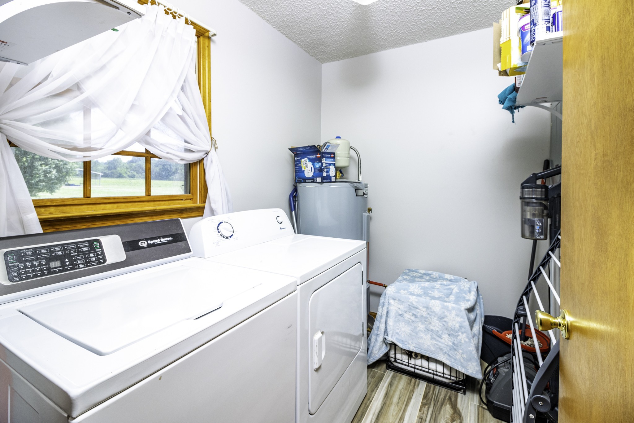2285 Crescentview Road Pulaski, TN 38478 - Photo 9 of 31 a utility room with dryer and washer