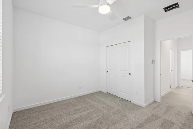 a view of a yard with an empty space