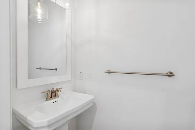 an empty room with a empty space and a ceiling fan