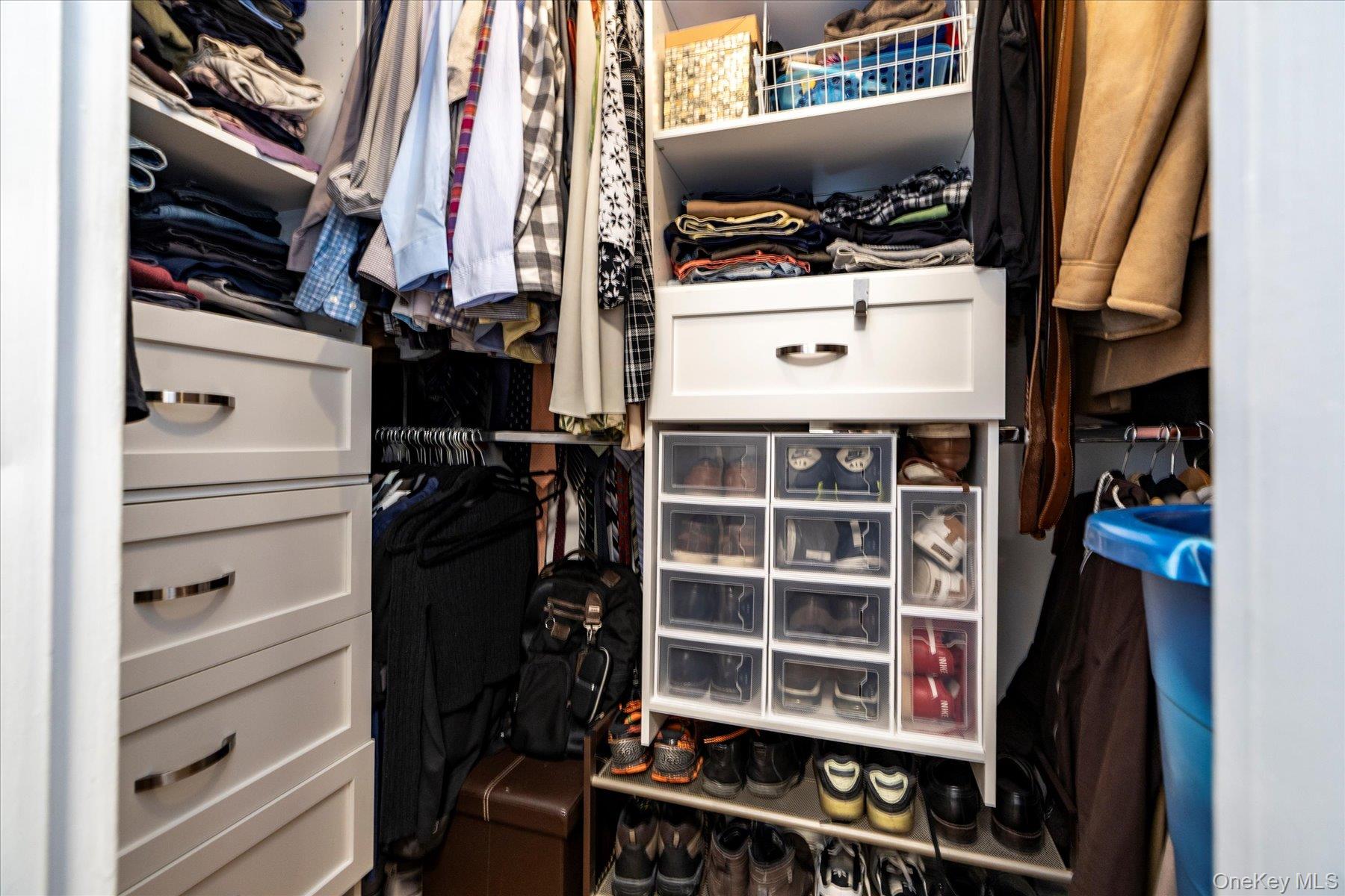 522 Shore Road, Unit 4A Long Beach, NY 11561 - Photo 15 of 32 a view of walk in closet with clothes and shoes