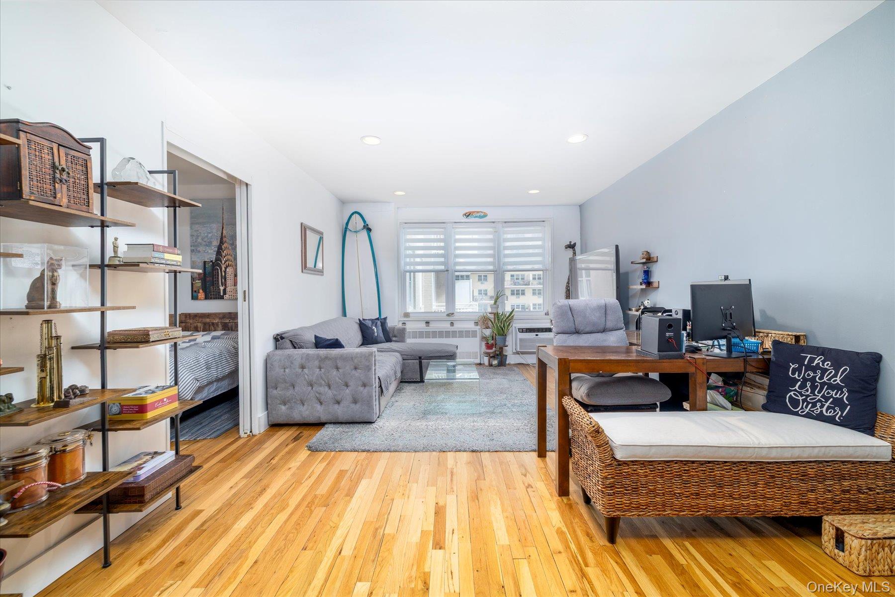 522 Shore Road, Unit 4A Long Beach, NY 11561 - Photo 3 of 32 a living room with furniture and a couch