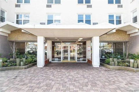a view of a building with a large window