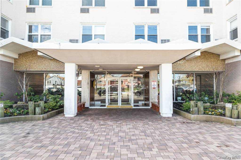 522 Shore Road, Unit 4A Long Beach, NY 11561 - Photo 31 of 32 a view of a building with a large window