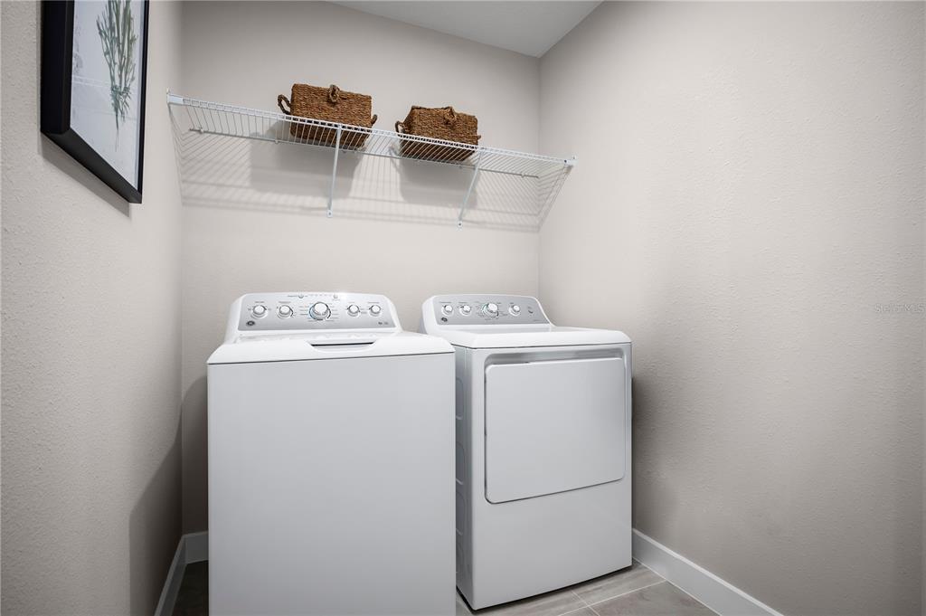 31391 Spanish Msn Road San Antonio, FL 33576 - Photo 15 of 26 a utility room with dryer and washer