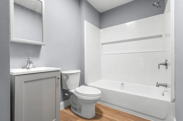 a bathroom with a sink toilet and bathtub