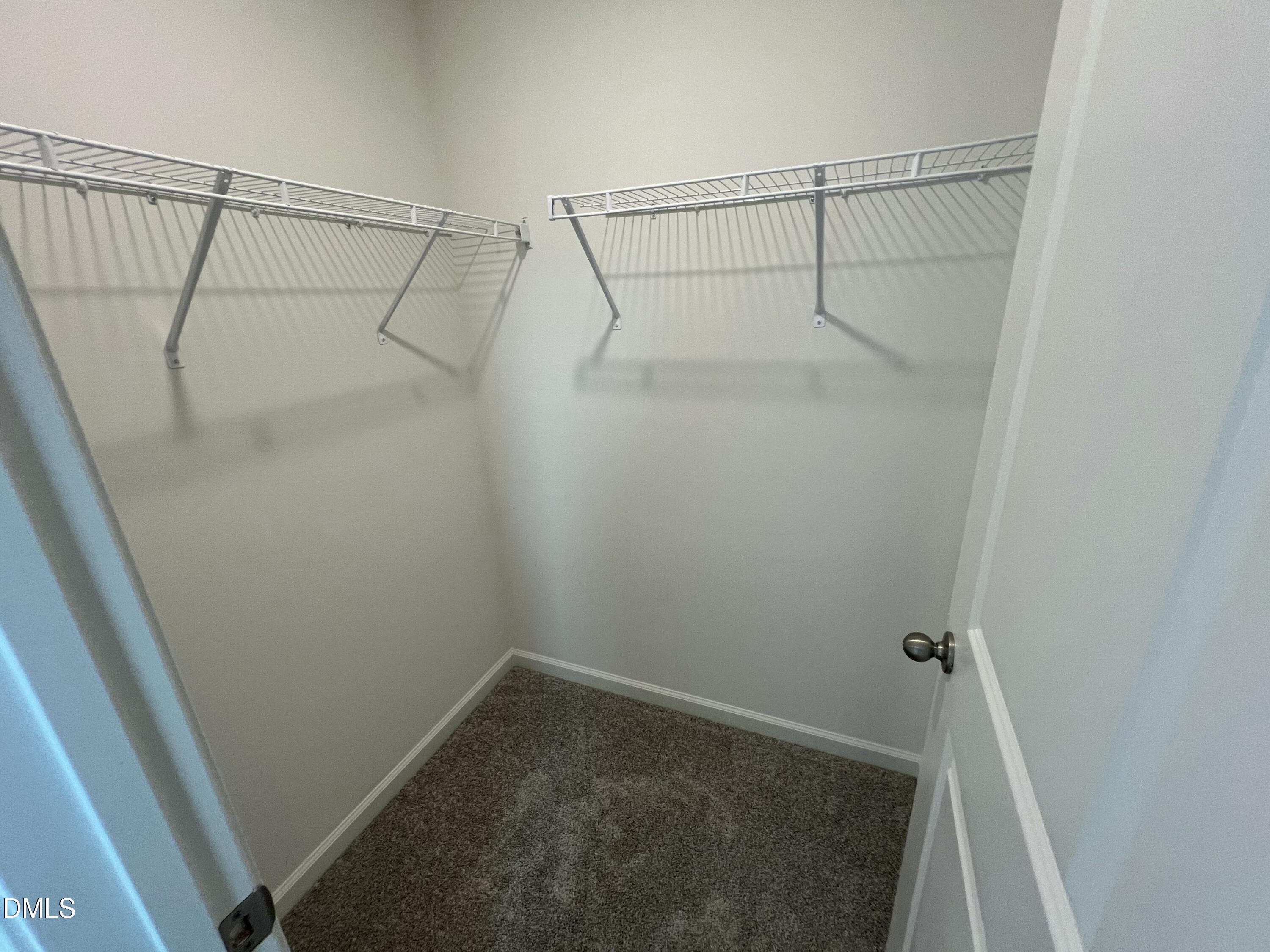 2204 Rabbitbrush Street Durham, NC 27704 - Photo 10 of 21 a view of a room with racks on the wall