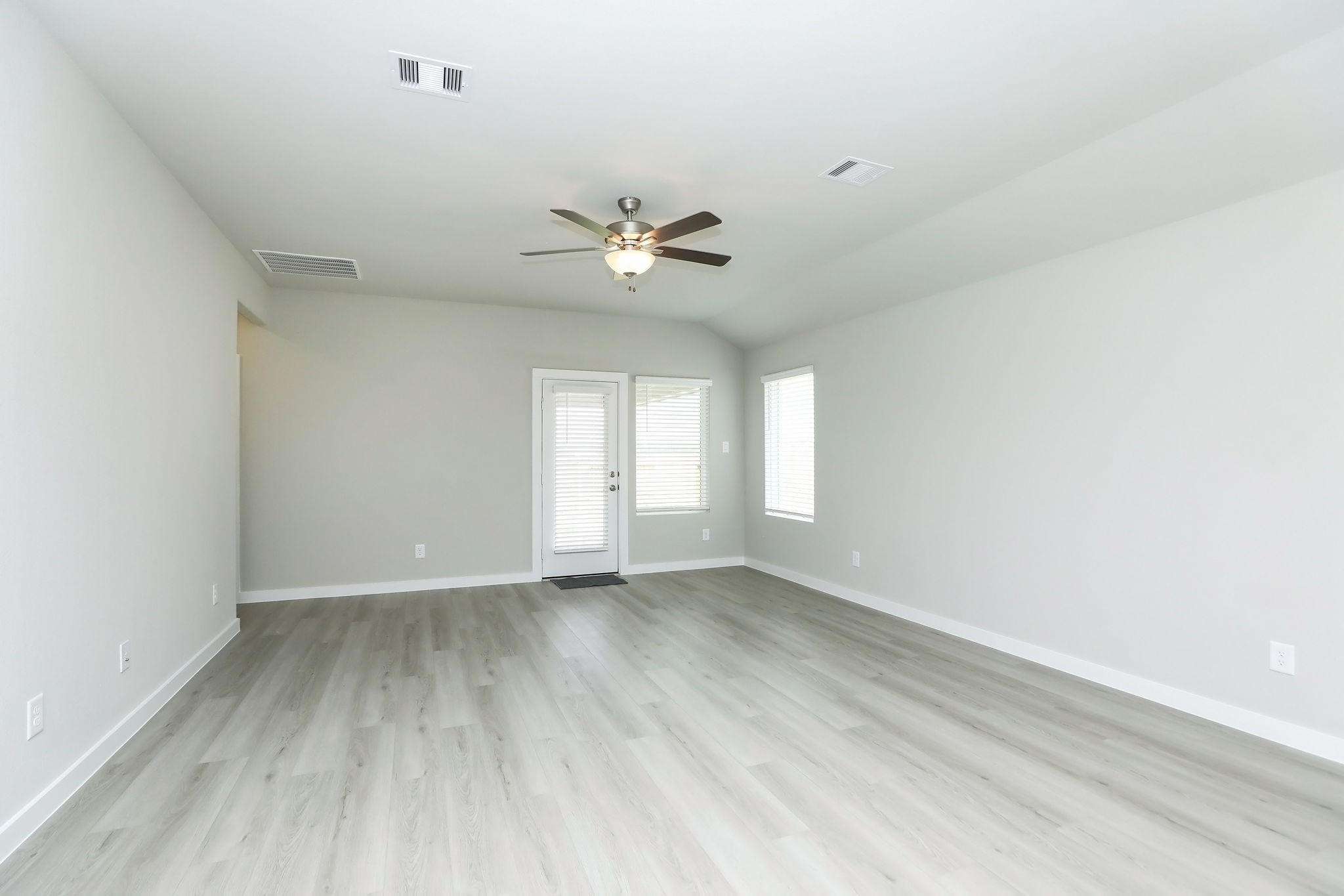 14110 Greystone Ter Street Magnolia, TX 77354 - Photo 32 of 34 The Oversized Family Room Is Ideal For Entertaining Or Just Hanging Out With The Family During A Quiet Evening At Home. The Open Floorplan Between The Kitchen And Family Room Allows The Host To Remain Part Of The Conversation And Fun!