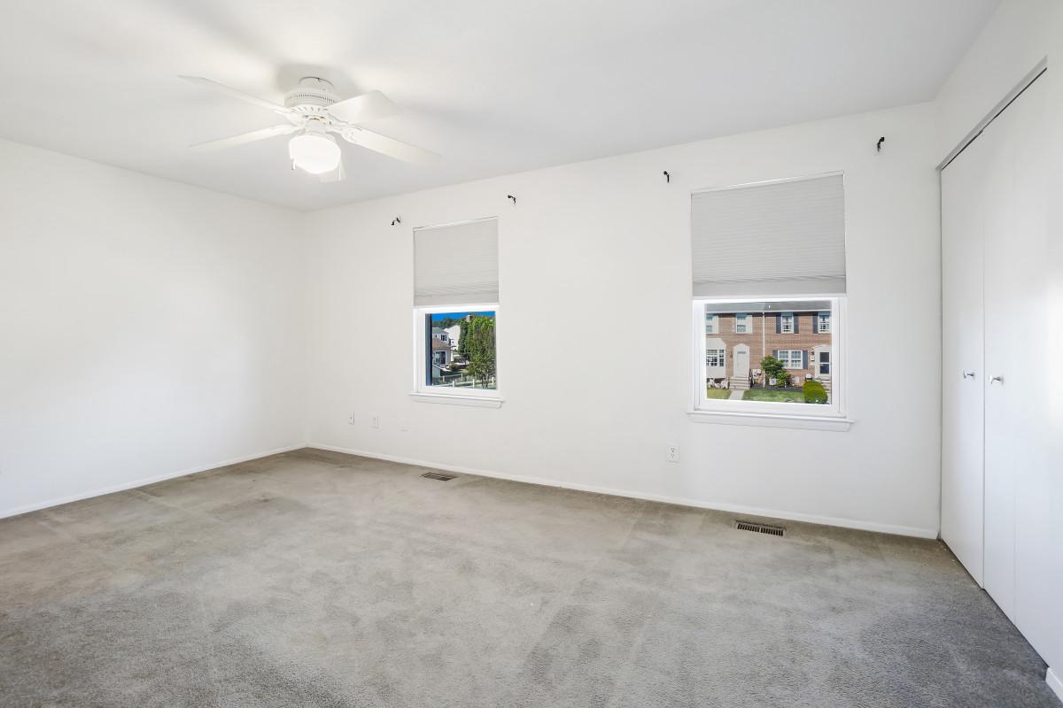 35 Bellfalls Way Nottingham, MD 21236 - Photo 16 of 30 an empty room with windows and fan