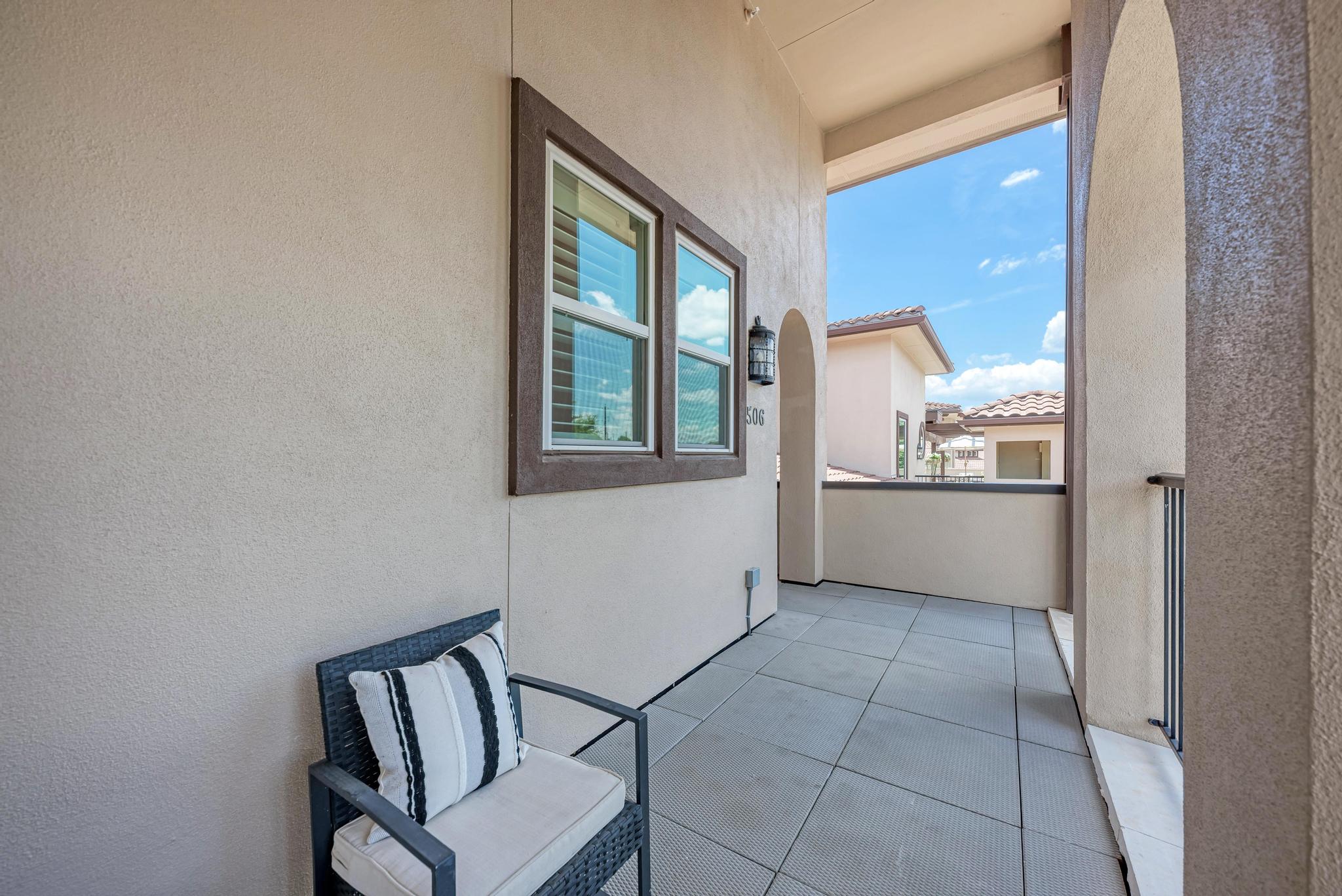 2601 North Quinlan Park Road, Unit 506 Austin, TX 78732 - Photo 4 of 39 Step out to a private balcony, perfect for serene outdoor relaxation.