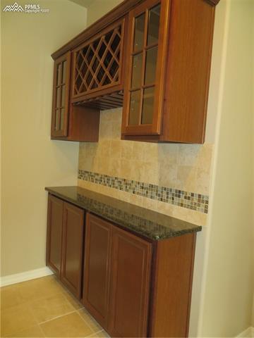 10604 Slumber Ridge Way Colorado Springs, CO 80908 - Photo 25 of 36 Wet Bar Cabinetry!