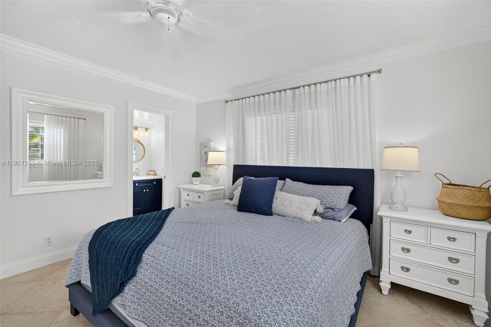 5681 Southwest 2nd Court, Unit 117 Margate, FL 33068 - Photo 16 of 26 a bedroom with a bed and window