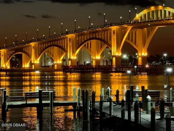 a view of swimming pool with outdoor seating