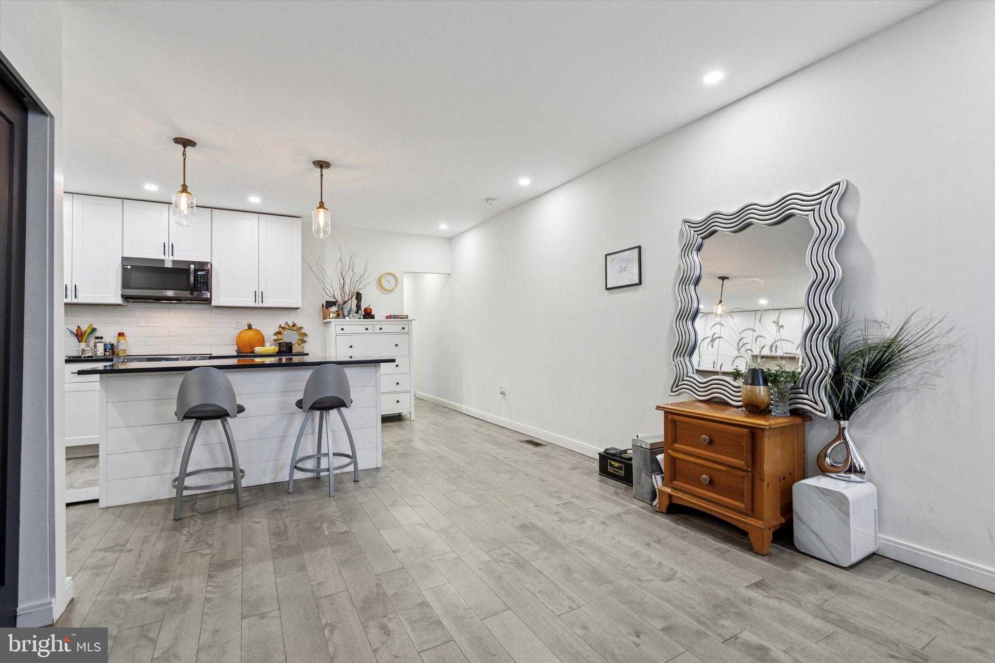 2694 Bridge Street Philadelphia, PA 19137 - Photo 25 of 41 a living room with kitchen and kitchen view