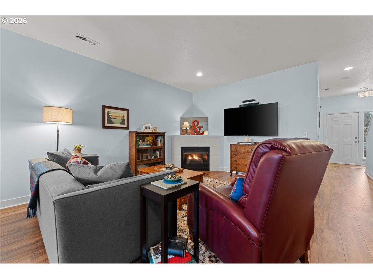 21123 Osburn Loop Fairview, OR 97024 - Photo 19 of 48 a living room with furniture and a flat screen tv
