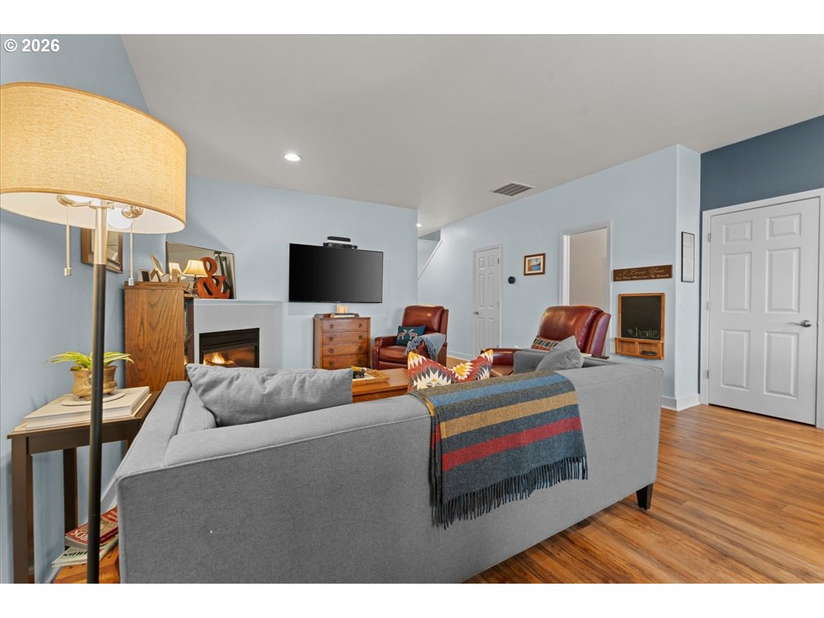 21123 Osburn Loop Fairview, OR 97024 - Photo 20 of 48 a living room with furniture and a flat screen tv