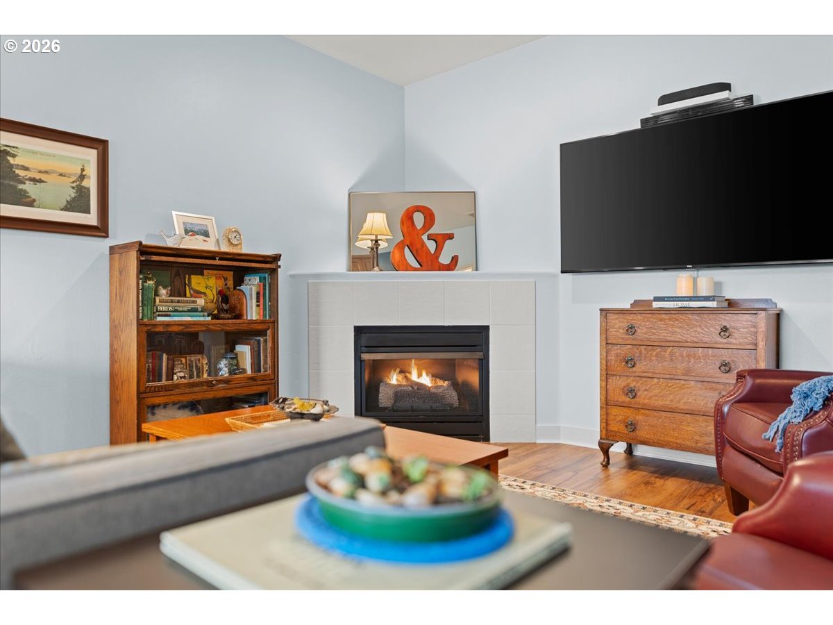 21123 Osburn Loop Fairview, OR 97024 - Photo 22 of 48 a living room with furniture and a flat screen tv