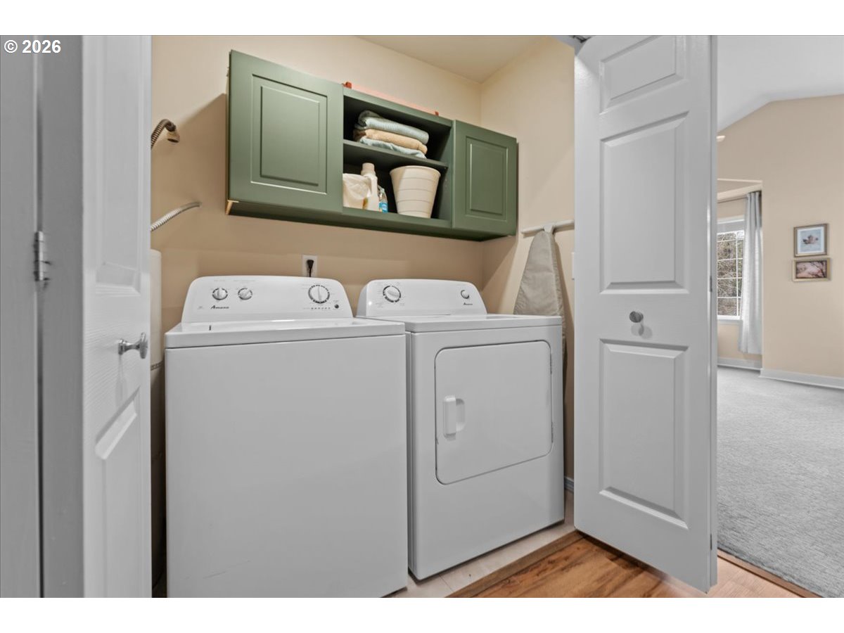 21123 Osburn Loop Fairview, OR 97024 - Photo 25 of 48 a utility room with dryer and washer