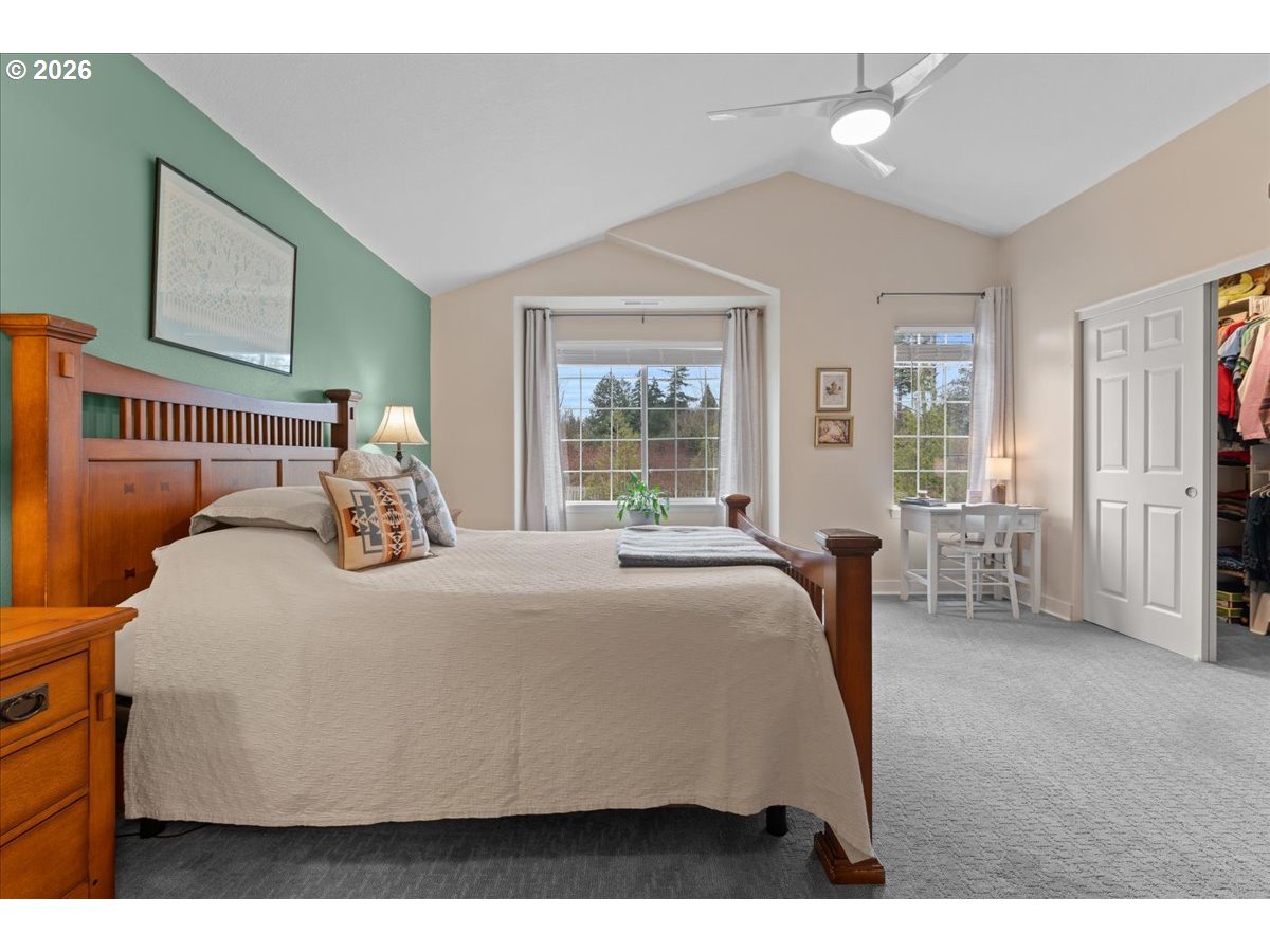 21123 Osburn Loop Fairview, OR 97024 - Photo 30 of 48 a bedroom with a bed and window