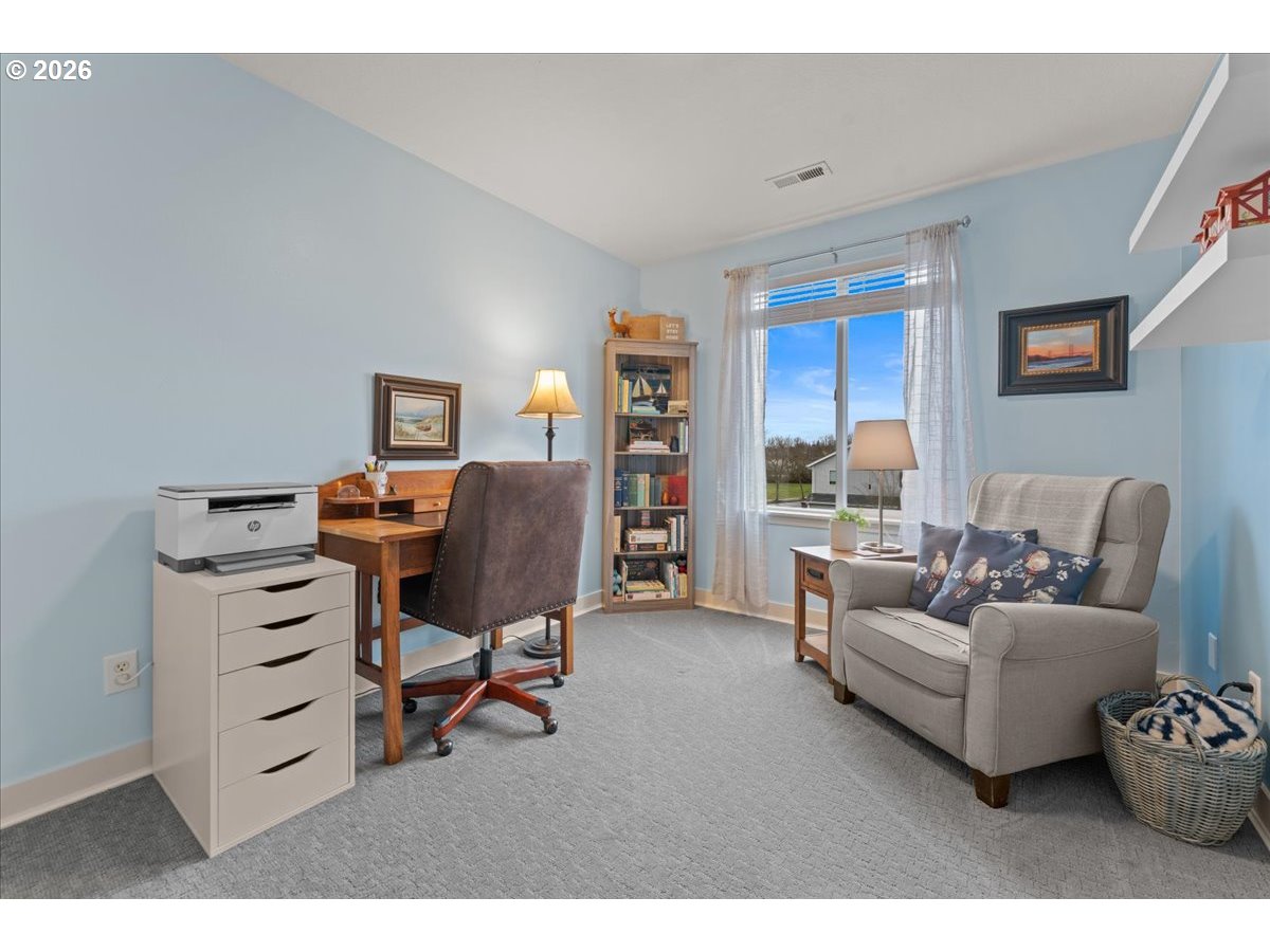 21123 Osburn Loop Fairview, OR 97024 - Photo 34 of 48 a living room with furniture and a large window