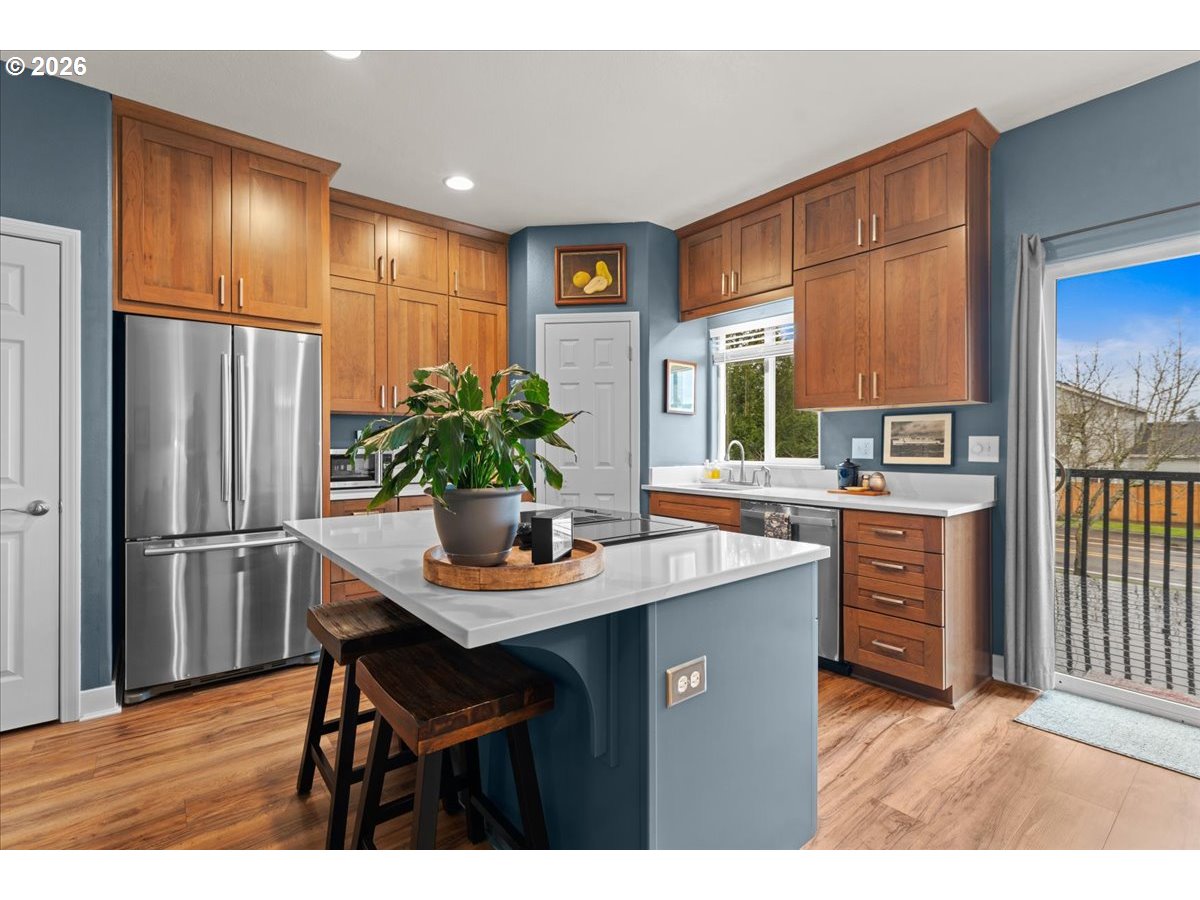 21123 Osburn Loop Fairview, OR 97024 - Photo 7 of 48 a kitchen with appliances cabinets and furniture