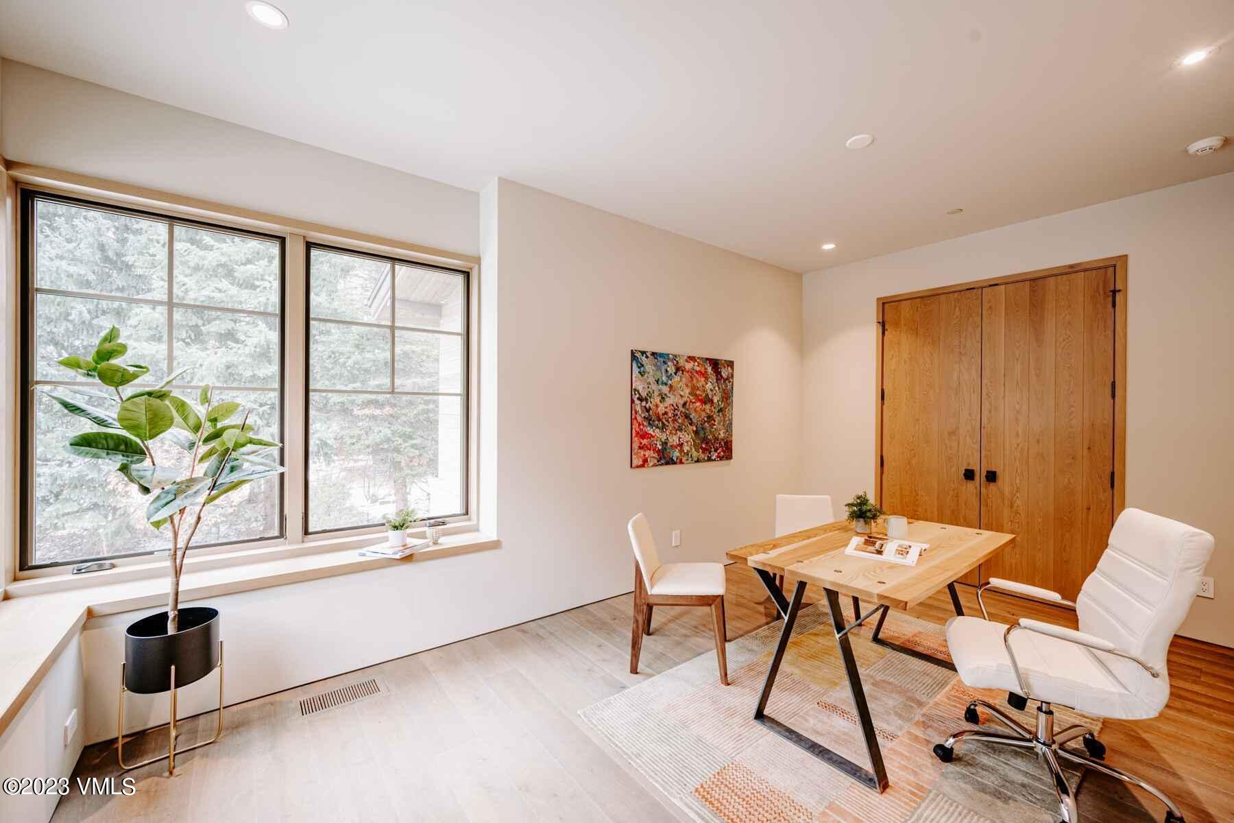 1033 Homestake Circle Vail, CO 81657 - Photo 18 of 30 a view of a workspace with furniture and a window